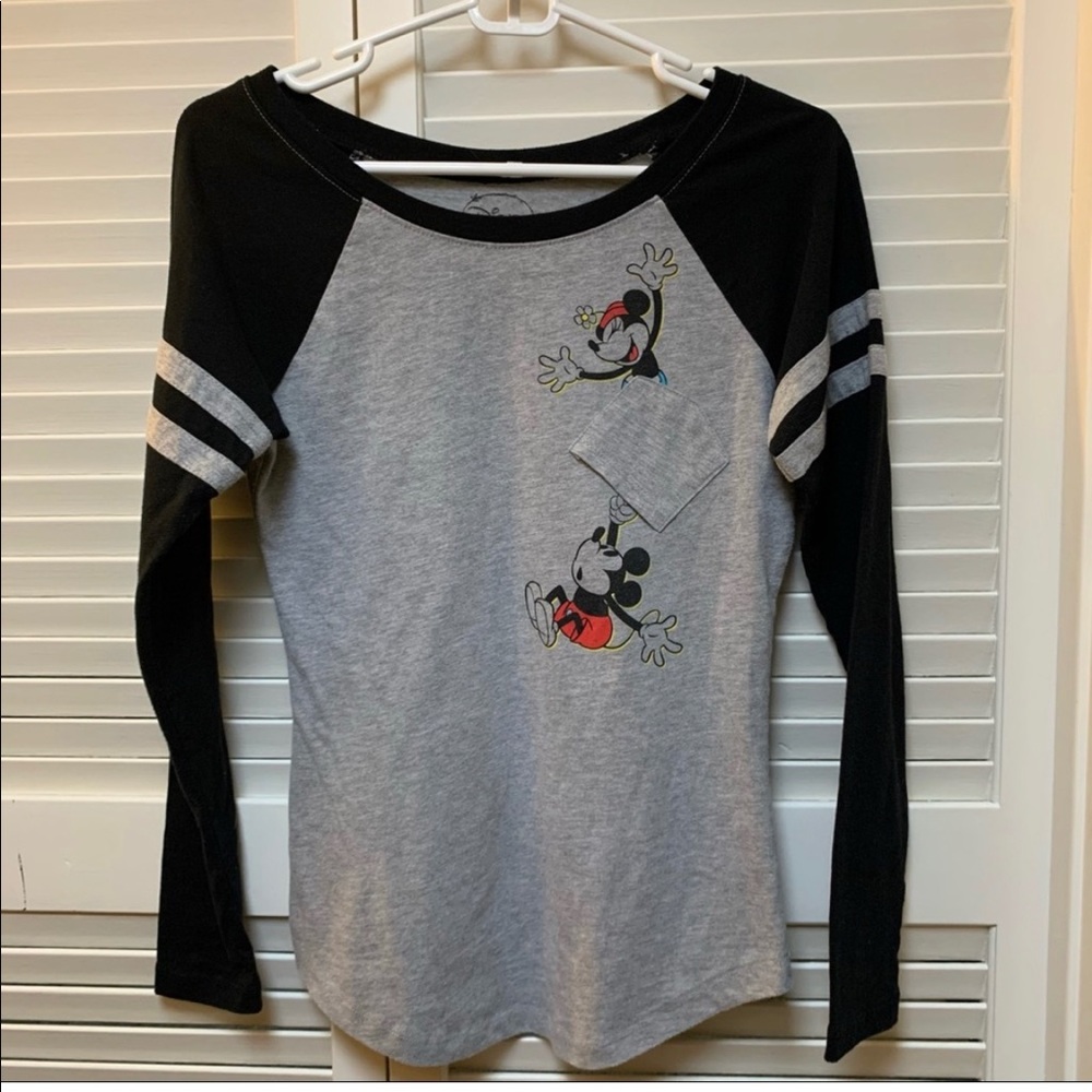 Two Disney T-shirts upside down pocket